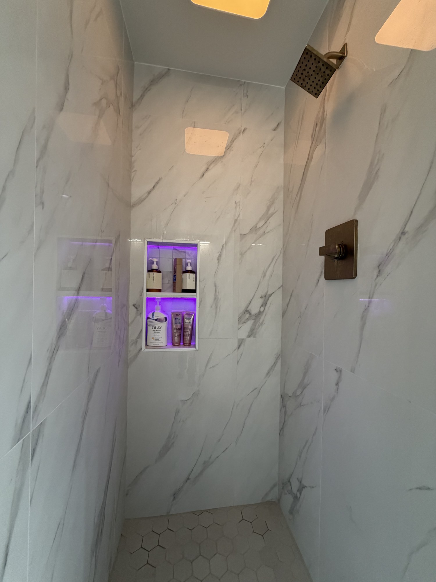 Tiled shower with niche built by IAC