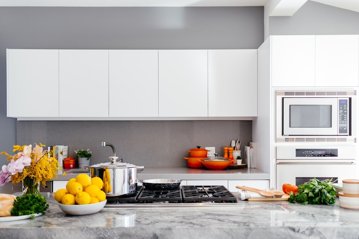 New kitchen with quartz countertops and subway tile